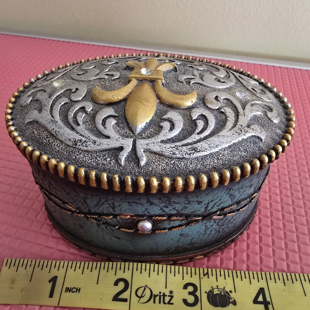 Decorative Oval Jewelry Box with Gold and Silver Accents